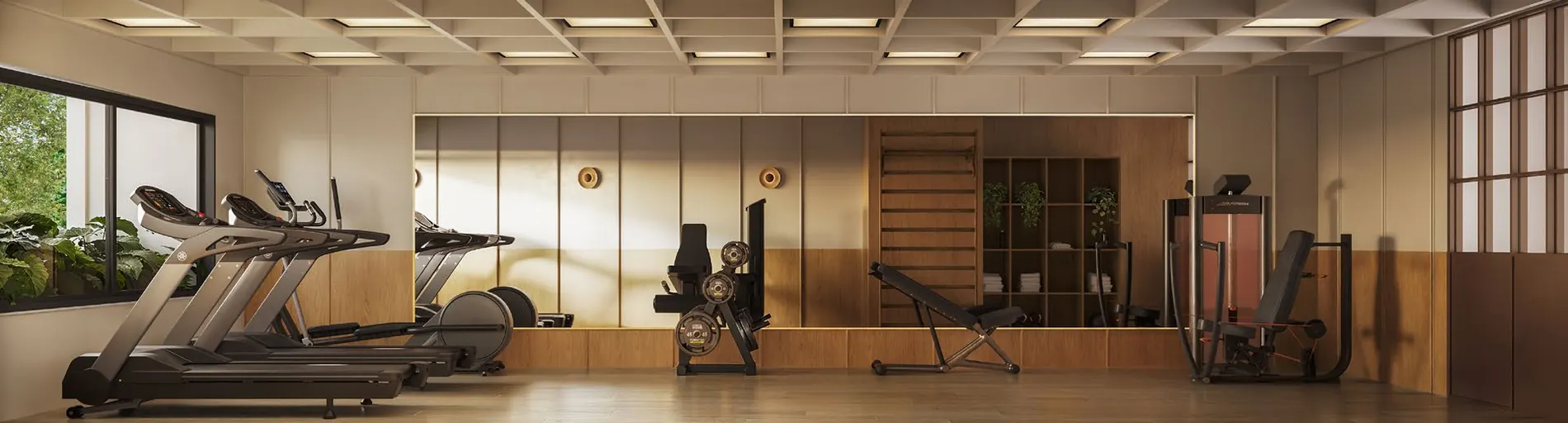 Academia do Parque Studios com esteiras, aparelhos de musculação e espelhos